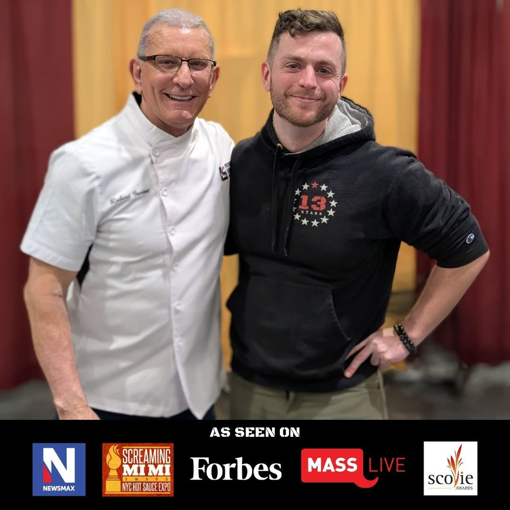 Sean from 13 Stars Hot Sauce and Chef Robert Irvine posing with logos at the bottom